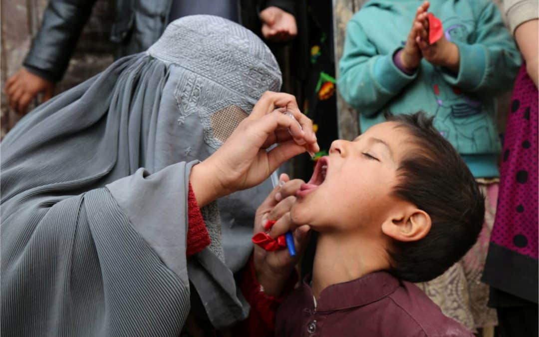 A child is vaccinated in Kandahar Afghanistan