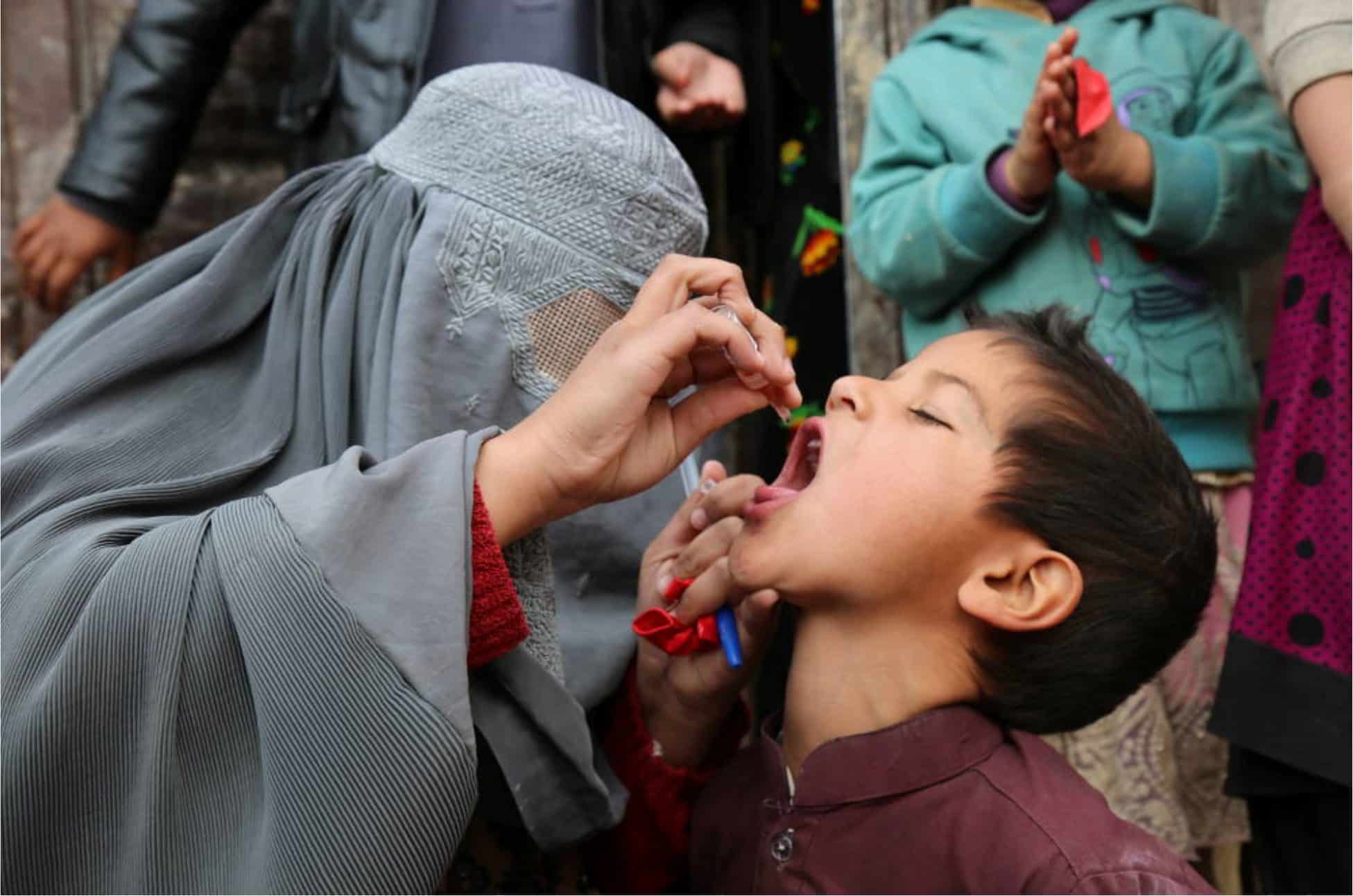 A child is vaccinated in Kandahar, Afghanistan